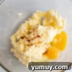 Gooey Chocolate Marshmallow Cookies 6 Creamed butter and egg in a glass mixing bowl, after mixing until combined.