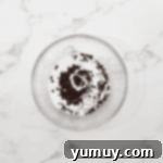 Boston Cream Delights 14 Semisweet chocolate chips and heavy cream in separate bowls, ready for melting.