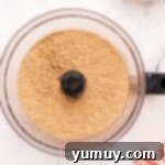 Smores Bars 6 crushed graham crackers in a food processor.