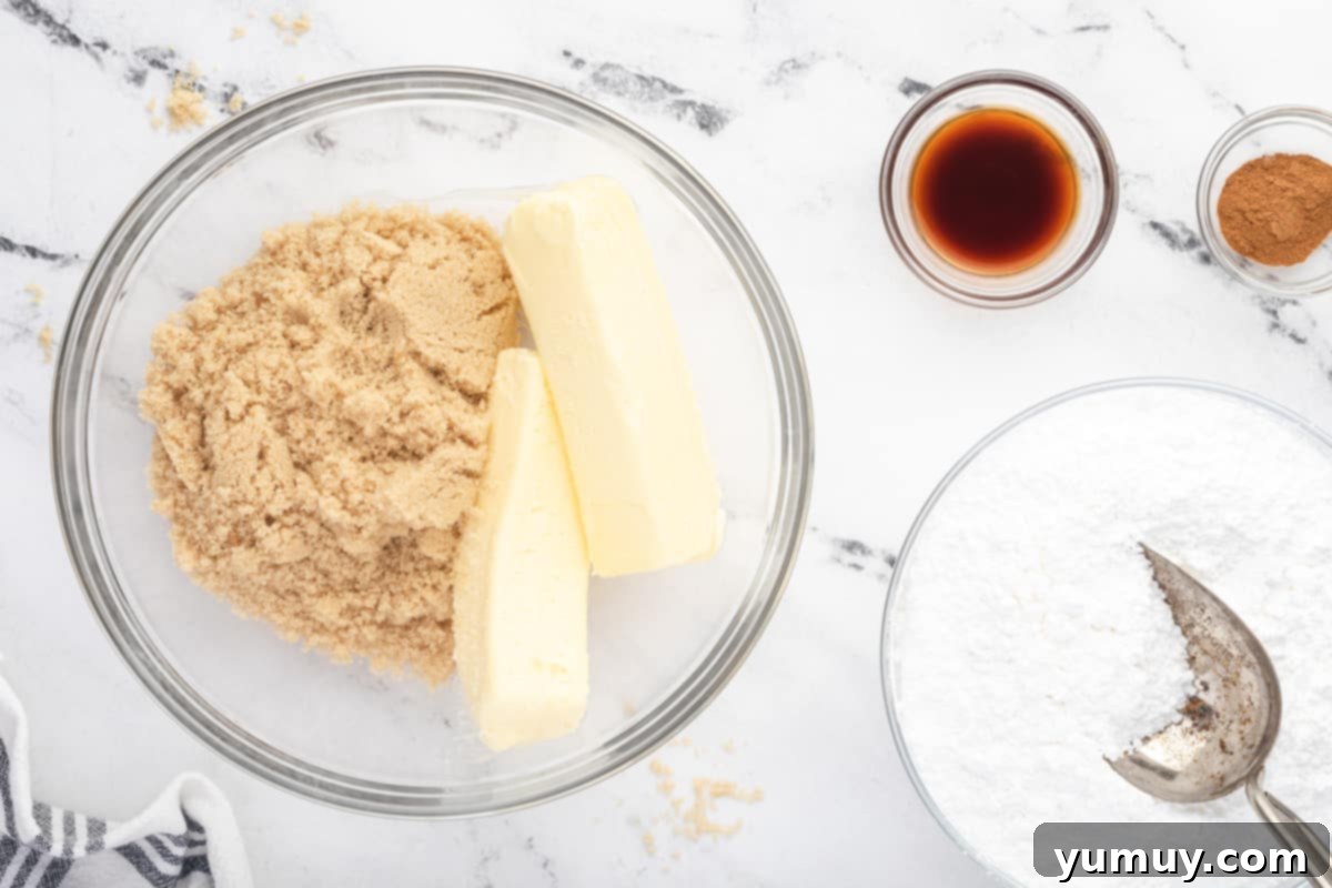 Caramelized Brown Sugar Buttercream 9 sticks of butter and brown sugar in a mixing bowl