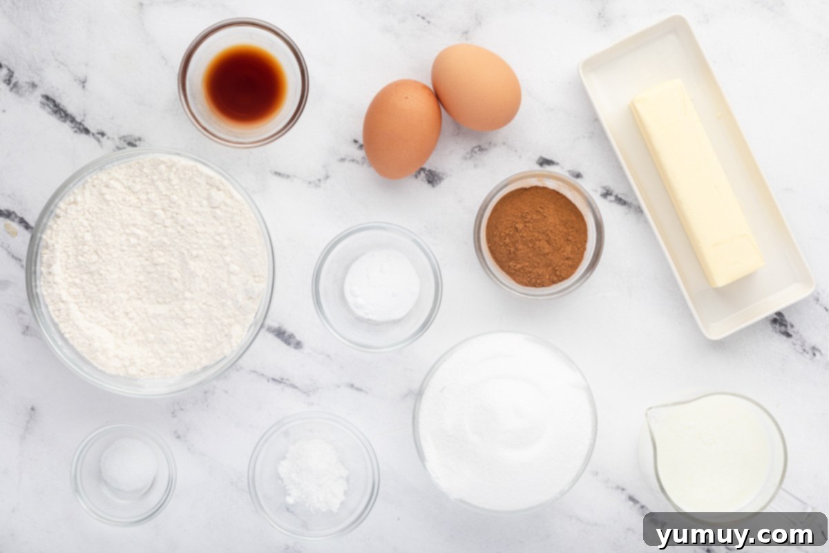 measured ingredients for snickerdoodle cupcakes in individual bowls.