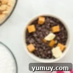 chocolate chips, caramel, and butter in a bowl, before melting