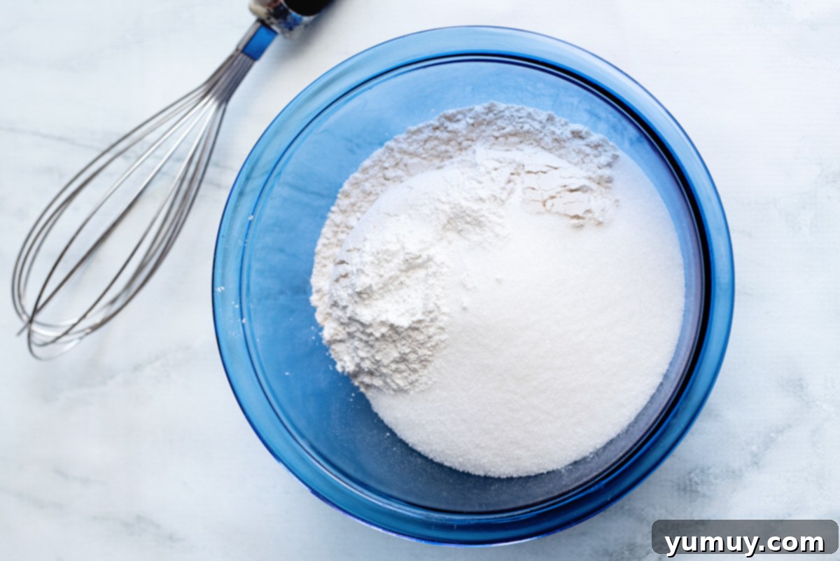 Snickerdoodle Swirl Bread 13 A bowl filled with dry baking ingredients, awaiting combination.