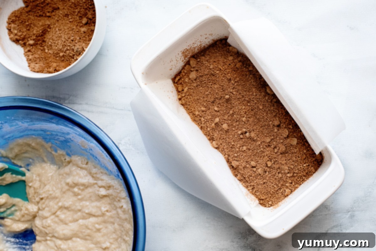 Snickerdoodle Swirl Bread 15 Quick bread dough expertly layered into a loaf pan with the inviting cinnamon brown sugar mixture.