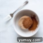 Snickerdoodle Swirl Bread 6 A bowl of brown sugar and cinnamon, perfectly combined with a fork.