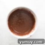 chocolate cupcake batter in a white bowl.