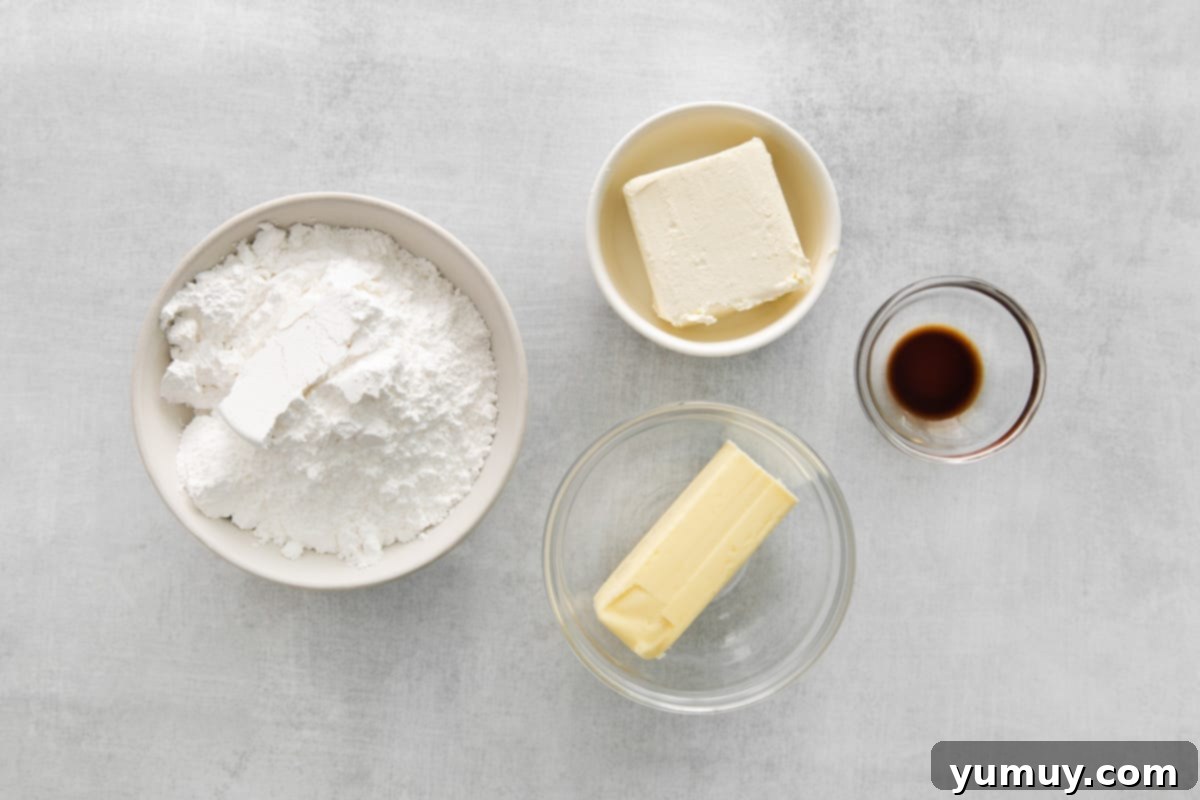 Softened butter and cream cheese in a mixing bowl, ready to be transformed into fluffy frosting.