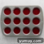 Indulgent Homemade Red Velvet Cupcakes 8 cupcake tin filled with batter