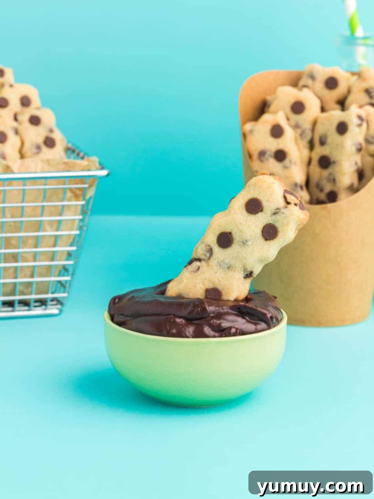 Golden Cookie Fries with Chocolate Chips 3 A crispy-on-the-outside, chewy-on-the-inside Chocolate Chip Cookie Fry being dipped into rich chocolate ganache.