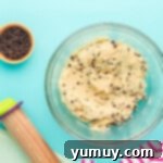 Golden Cookie Fries with Chocolate Chips 7 Freshly mixed chocolate chip cookie dough in a bowl, speckled with mini chocolate chips.