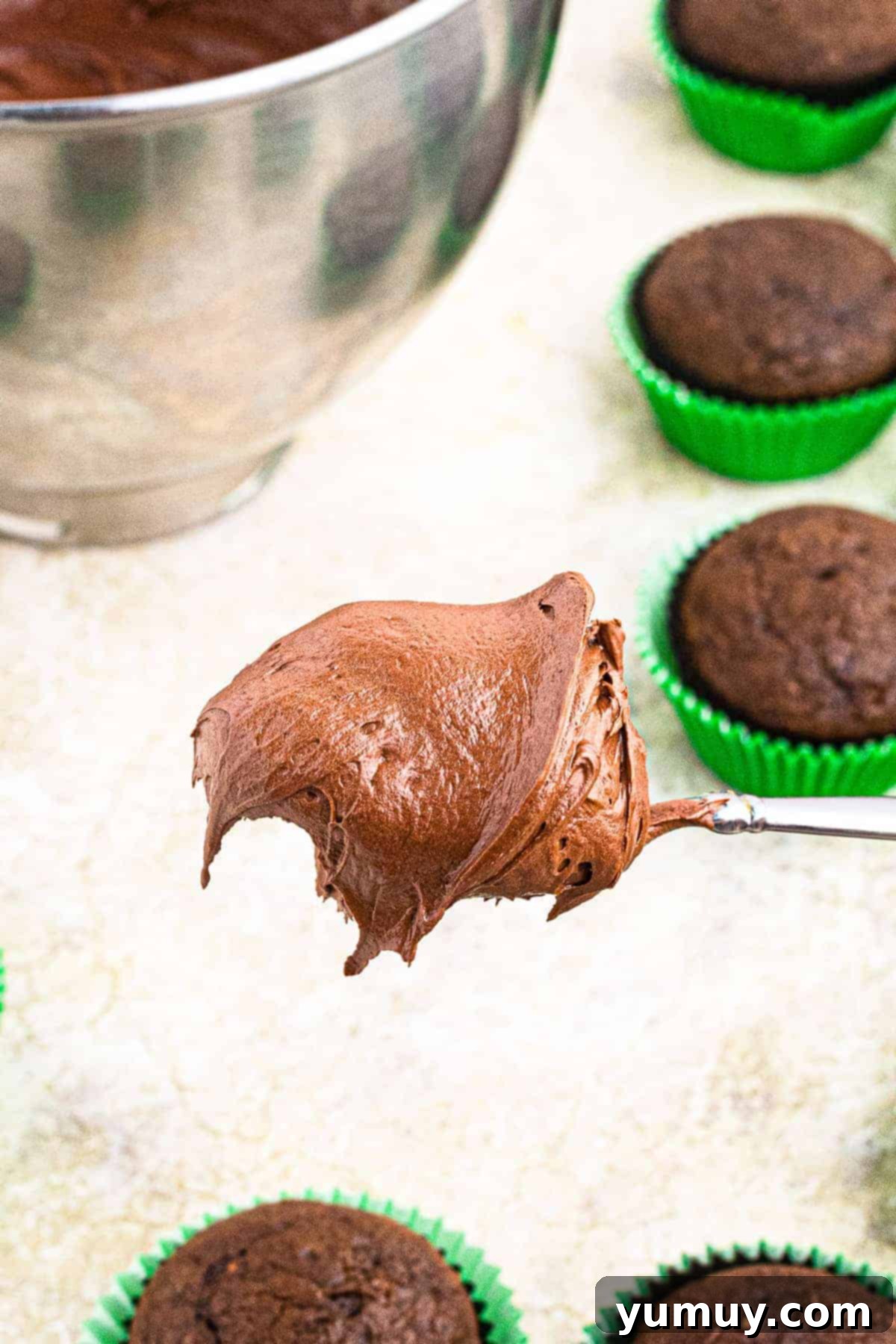 Decadent Chocolate Cream Cheese Frosting 3 chocolate cream cheese frosting on knife