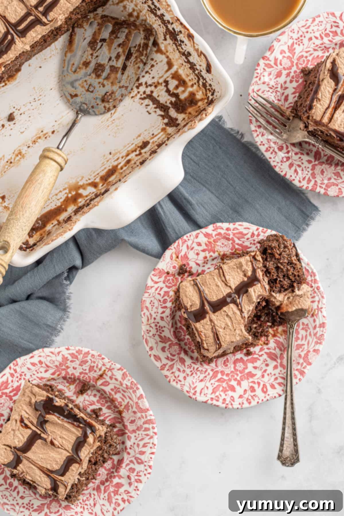 pieces of chocolate tres leches cake on plates