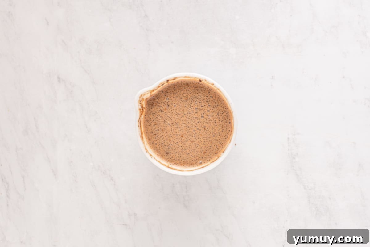 turkish coffee in a cup on a marble surface.