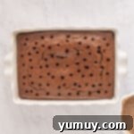 poking holes into the cake