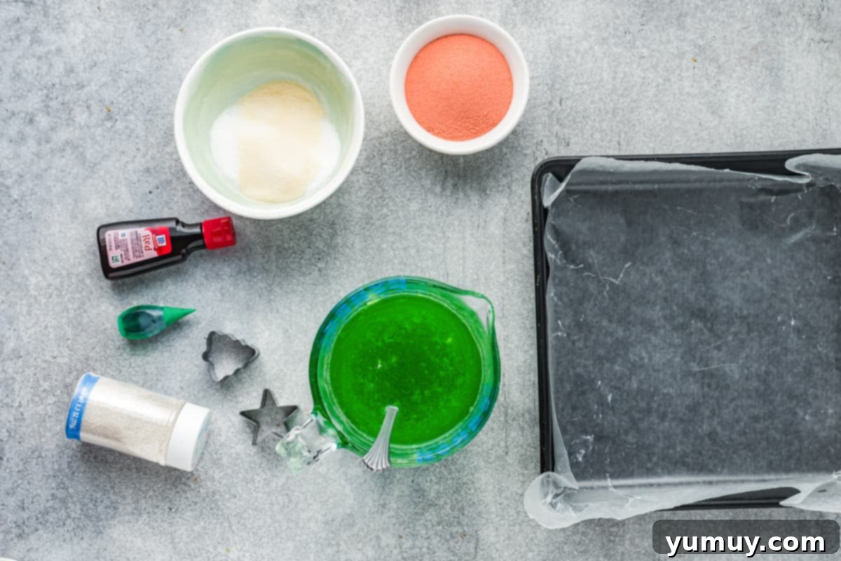 Bowls of cherry and lime Jell-O mixtures, with unflavored gelatin, ready for the next step in making Christmas gumdrops.