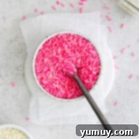 Crafting Custom Colored Sprinkles 4 Close-up image showing how to dye sprinkles in a resealable bag.