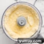 Combined ingredients in a food processor.