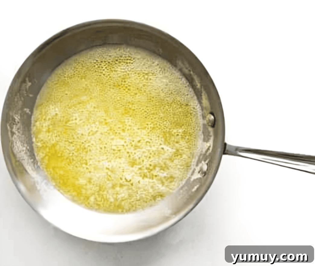 The Secret to Golden Brown Butter 9 melted butter in a frying pan.