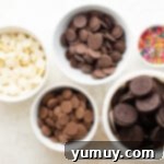 chocolate covered Oreo ingredients (cookies, chocolate melts, and sprinkles) in small bowls