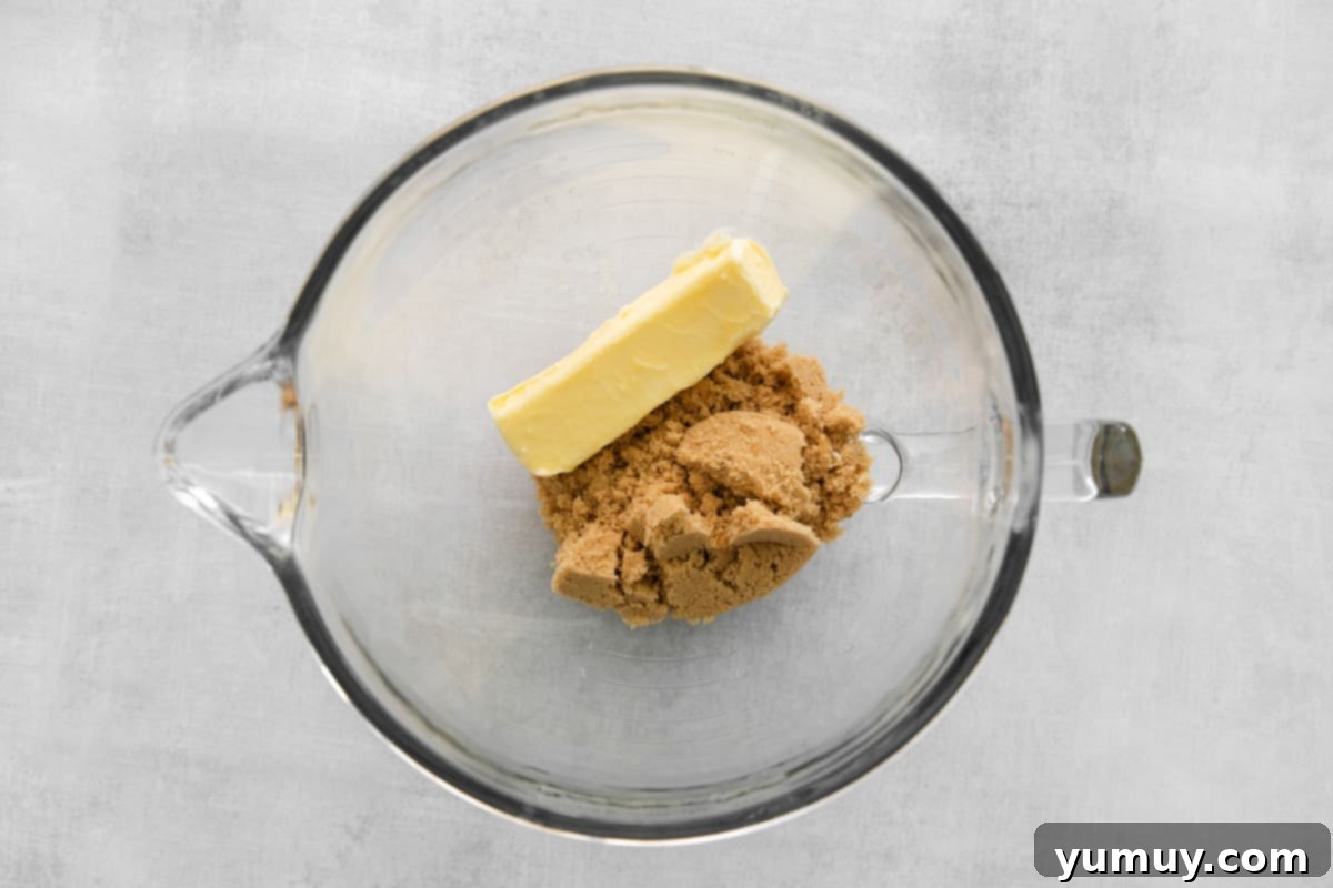 Creaming butter and brown sugar in a stand mixer for cowboy cookies