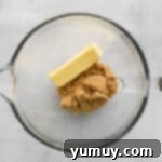 butter and sugar creamed together in a stand mixer bowl