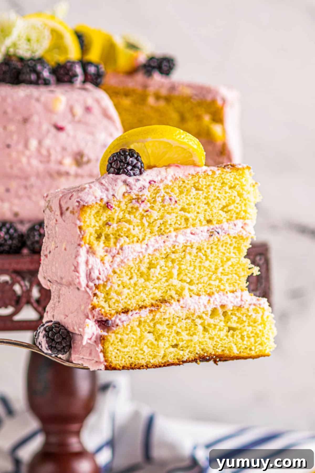 Sun-Kissed Lemon Blackberry Symphony 3 slice of lemon blackberry layer cake