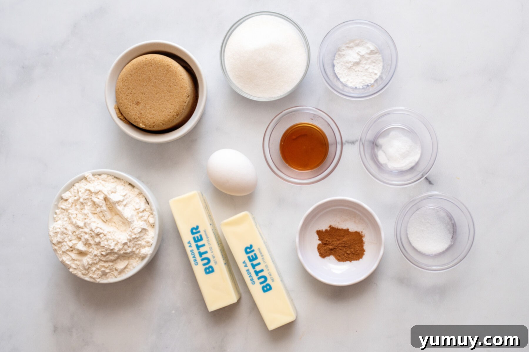 Golden Brown Sugar Delights 5 All the essential ingredients for making brown sugar cookies laid out on a kitchen counter.