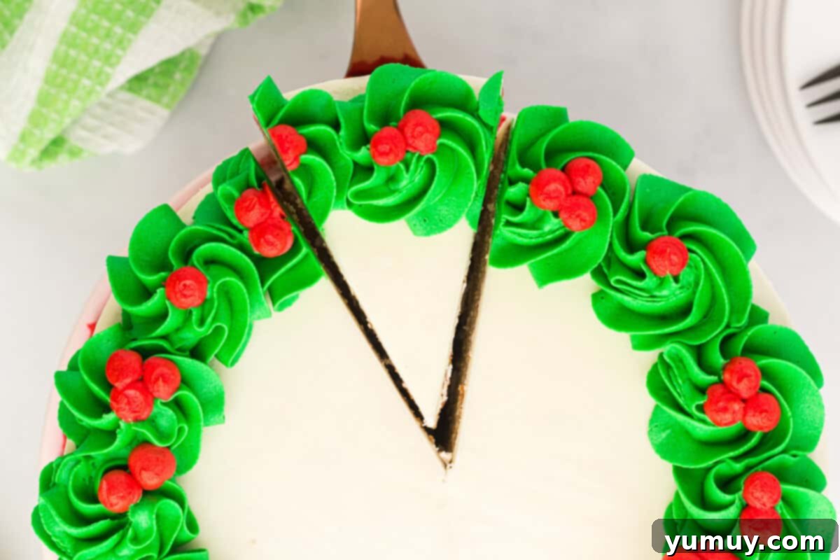 overhead view of christmas wreath cake, with green frosting around the edges
