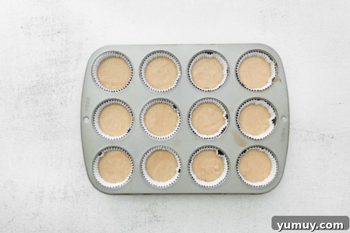 Decadent Tiramisu Cupcakes 14 a 12-count cupcake tin filled with cupcake batter.