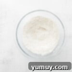 Decadent Tiramisu Cupcakes 5 dry ingredients for tiramisu cupcakes in a glass bowl.