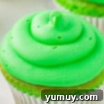 cupcake topped with green frosting