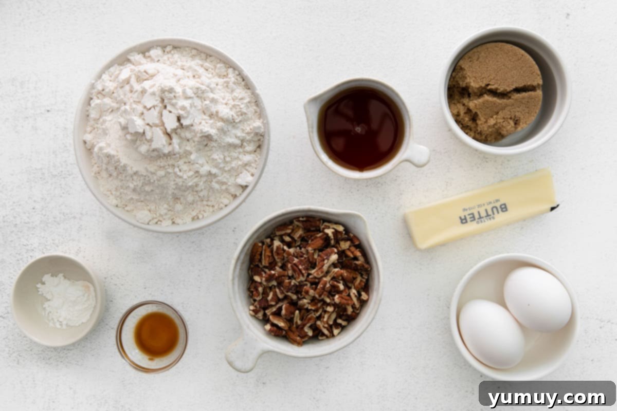 overhead view of measured ingredients for maple pecan biscotti.