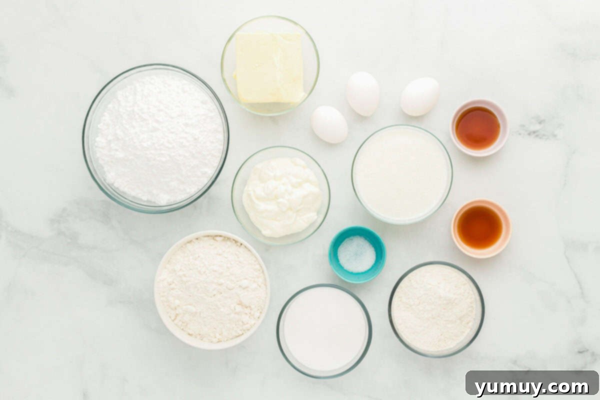 Winged Whimsy Cake 5 Overhead view of all the ingredients laid out for preparing the delicious airplane cake, ready for mixing.