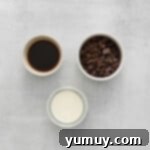 Overhead view of ganache ingredients perfectly arranged in pristine white and clear glass bowls.