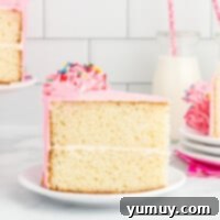 featured image of a delightful doctored white cake mix, beautifully frosted and ready to serve.