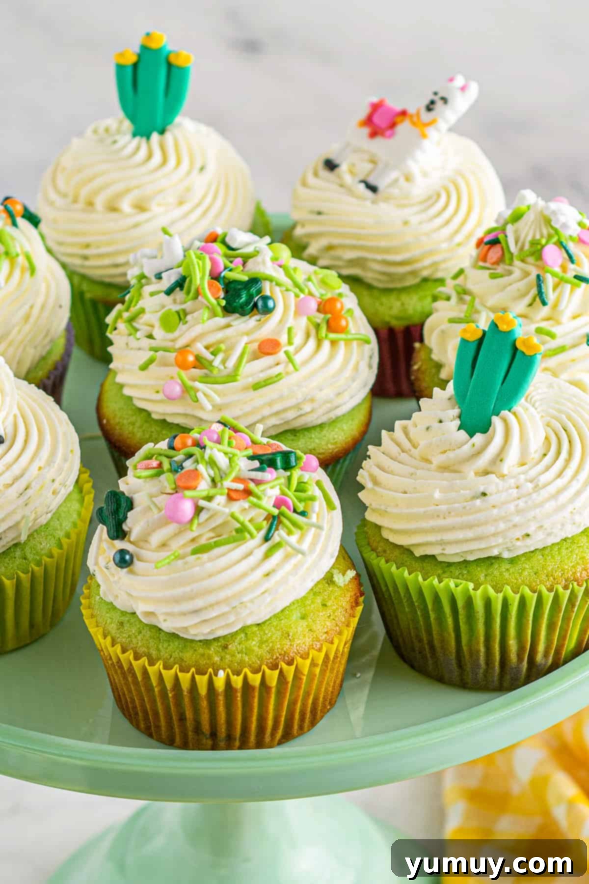 Cinco de Mayo Fiesta Cupcakes 3 platter of festive pinata cupcakes for cinco de mayo, topped with lime buttercream and sprinkles