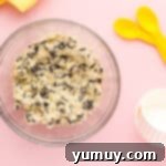 Safe-to-Eat Oreo Cookie Dough 7 Overhead view of Oreo cookie dough in a glass bowl.