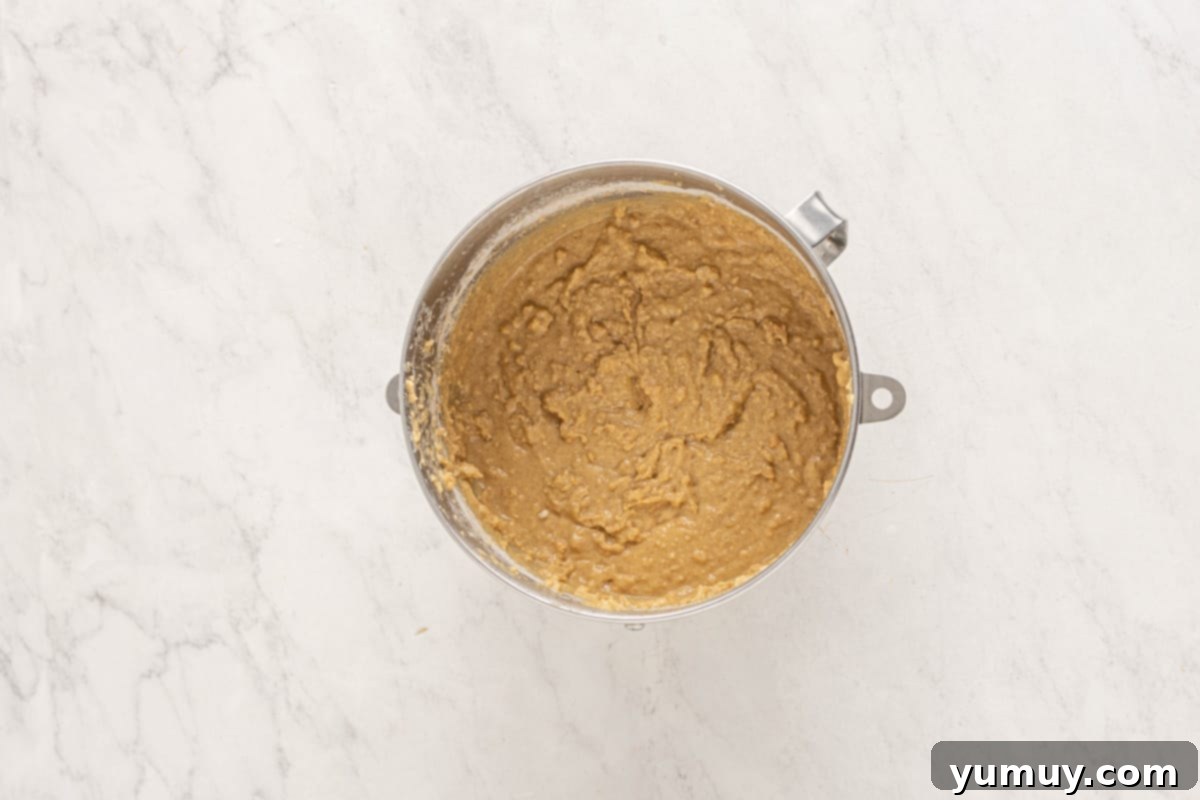 smores cake batter in a stainless mixing bowl.