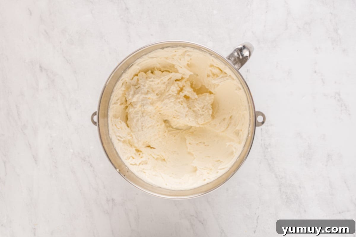 Buttercream frosting in a mixing bowl.