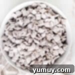 DIY Puppy Chow Perfection 14 A bowl of cereal on a table, representing the finished puppy chow.