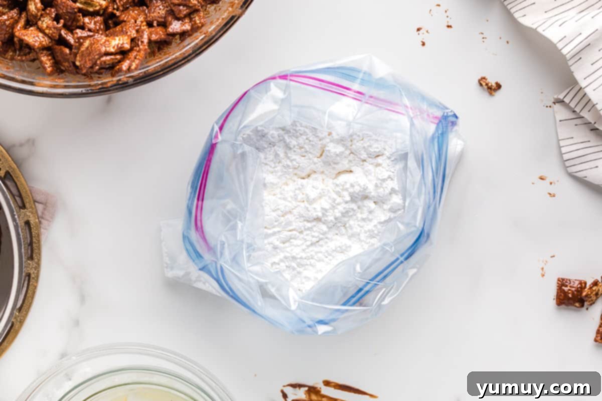 DIY Puppy Chow Perfection 10 Powdered sugar measured and placed into a resealable bag.