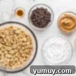 DIY Puppy Chow Perfection 5 Ingredients for puppy chow: Chex cereal, peanut butter, chocolate chips, butter, and powdered sugar.