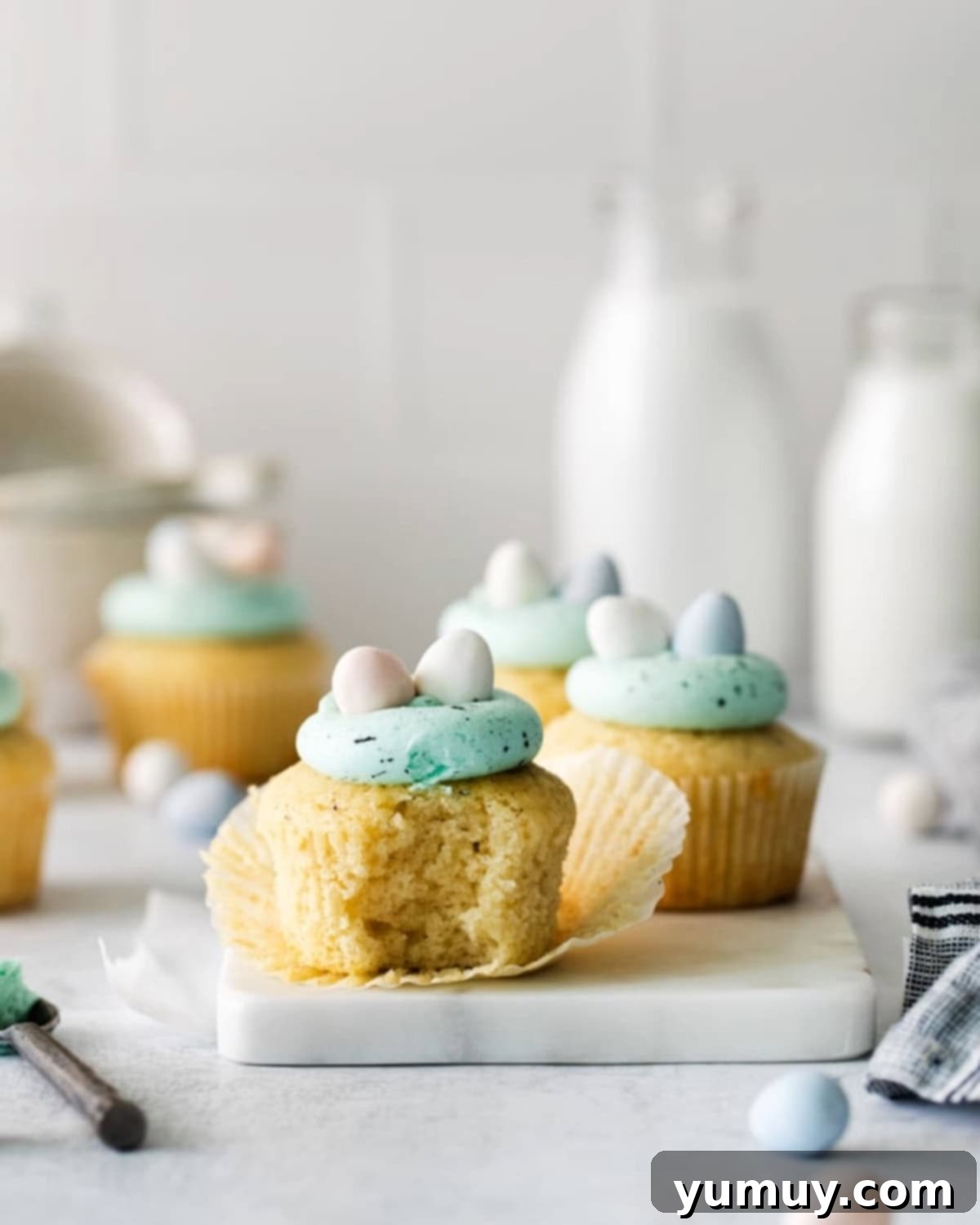 cupcakes topped with robin egg candies