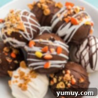 hot cocoa bombs with candy pieces on plate