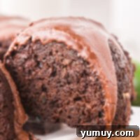 Luscious Chocolate Zucchini Bundt 4 Featured chocolate zucchini bundt cake, showcasing its rich texture and delicious glaze.