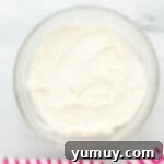 white frosting in a glass bowl.