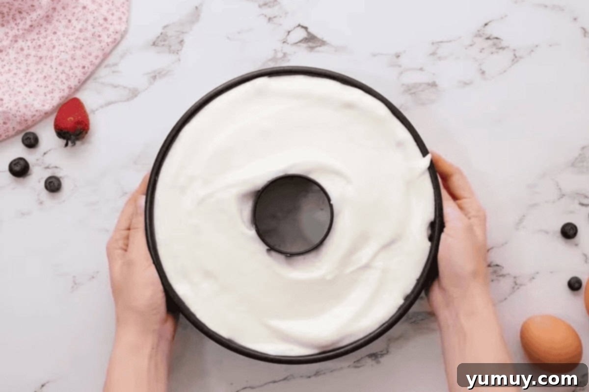 Airy Dream Cake 15 angel food cake batter in a tube pan.