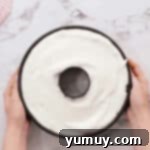 Airy Dream Cake 9 angel food cake batter in a tube pan.