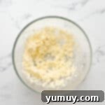 Bursting Blueberry Bundt 7 Creamed butter and sugar in a glass bowl, light and fluffy.