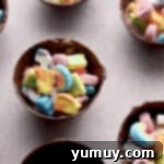 Magical Lucky Charms Hot Cocoa Bombs 7 Chocolate half-spheres filled with hot chocolate mix and colorful Lucky Charms marshmallows.